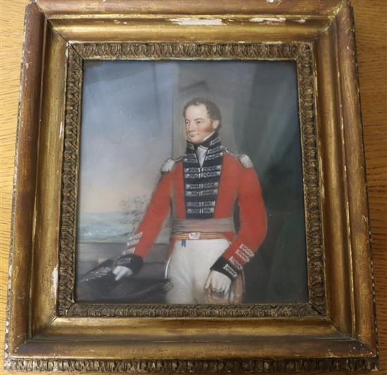 19th century English School, pastel portrait of an army officer, 24 x 21cm and a family coat of arms